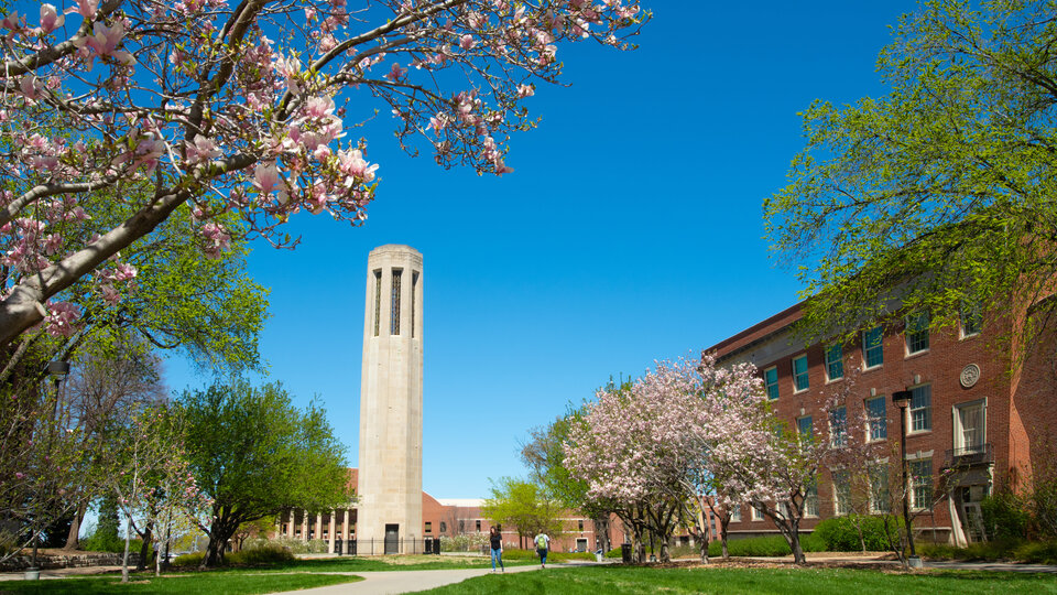 The trees are in full bloom around the Mueller Bell Tower as spring makes its appearance on UNL’s City Campus. April 19, 2019. Photo by Gregory Nathan / University Communication.
