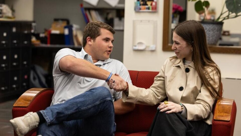 ASUN President-elect Kurt Schneider shakes hands with Nexus presidential candidate Kyanne Casperson, after he was announced the winner of the election in the ASUN office on Wednesday, April 1, 2026, in Lincoln. Photo by Justin Diep | The Daily Nebraskan